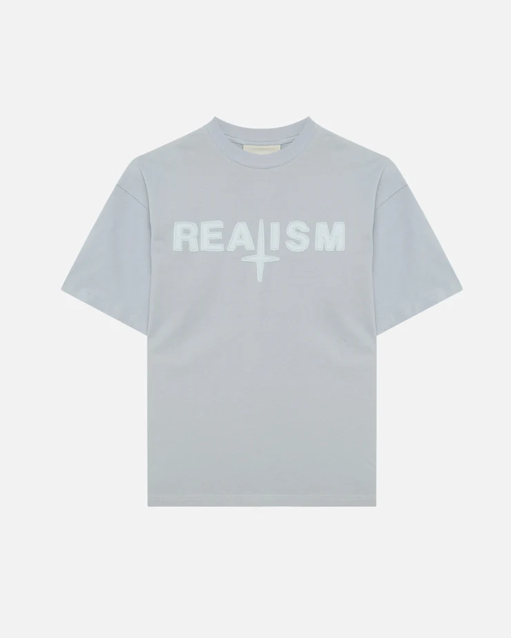 SSS REALISM VIVANT TEE POWDER BLUE SSS REALISM VIVANT TEE POWDER BLUE